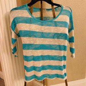 Teal and cream blouse